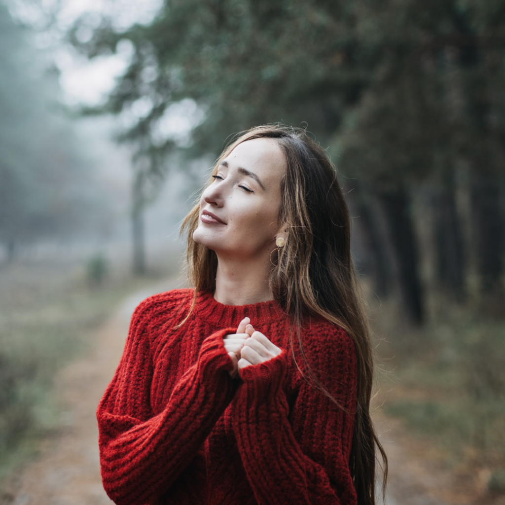 Mindfulness-based cognitive , Mindfulness practices. Young woman with long hair relaxing in forest