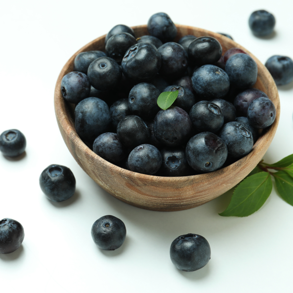 Fresh Blueberry with Leaves on White Background