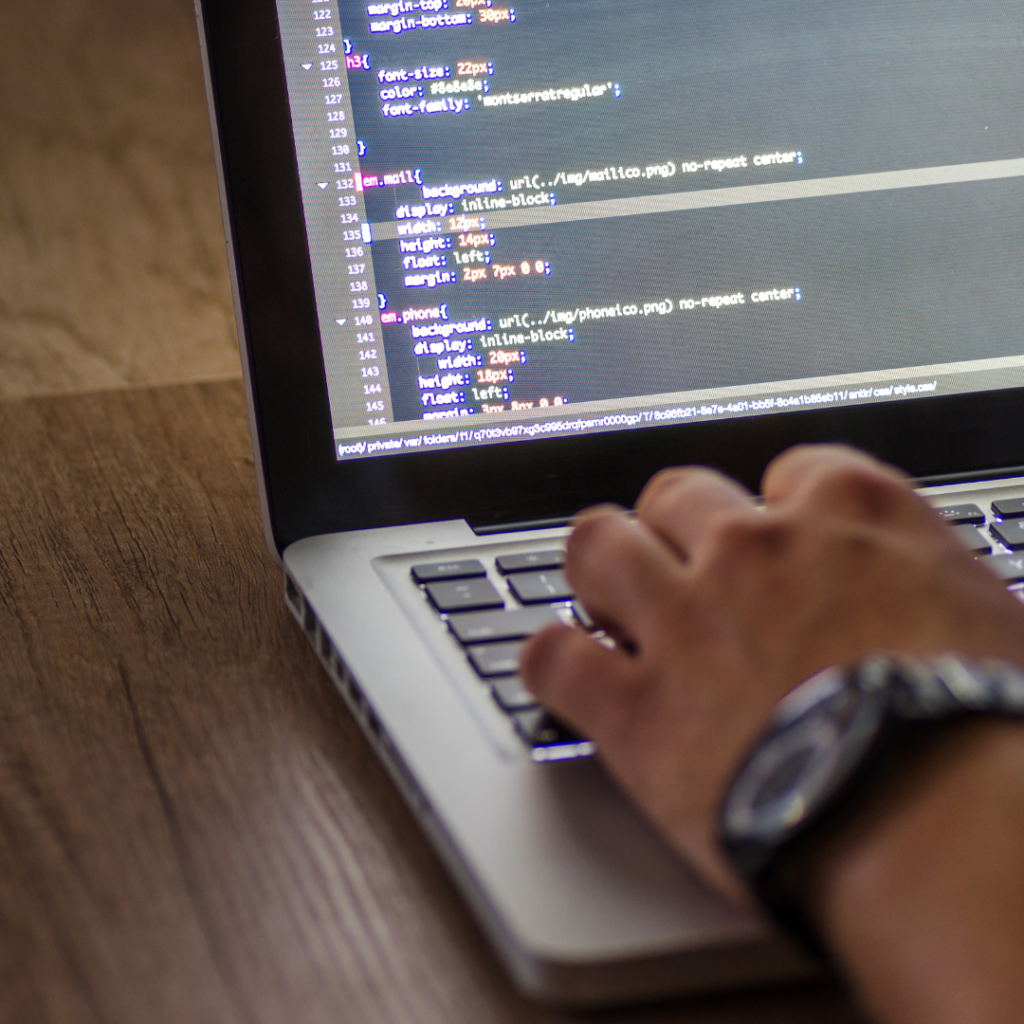 Man Working on Laptop in Office