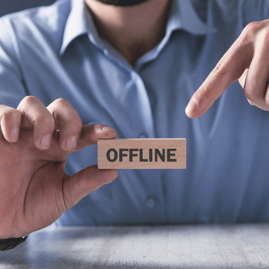 Man holding wooden block. Offline