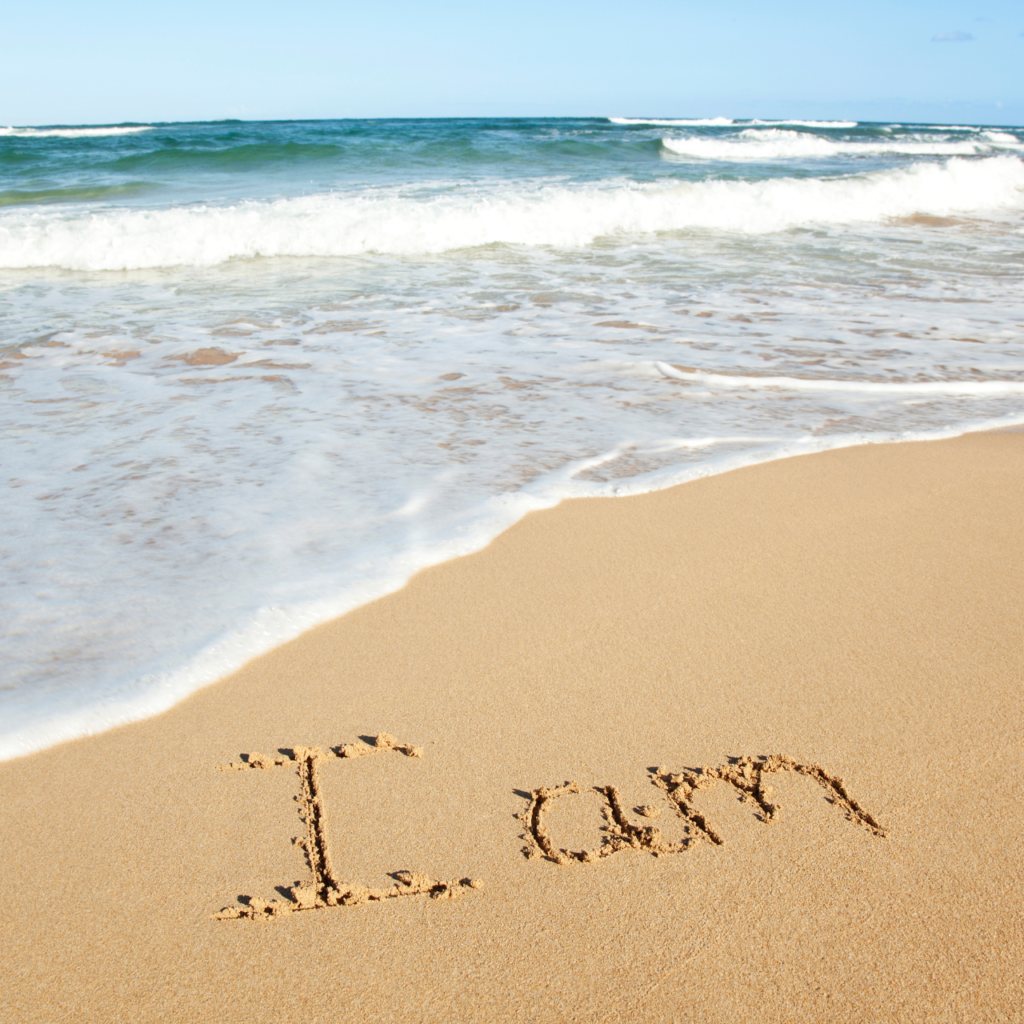 "I am" in the sand beach