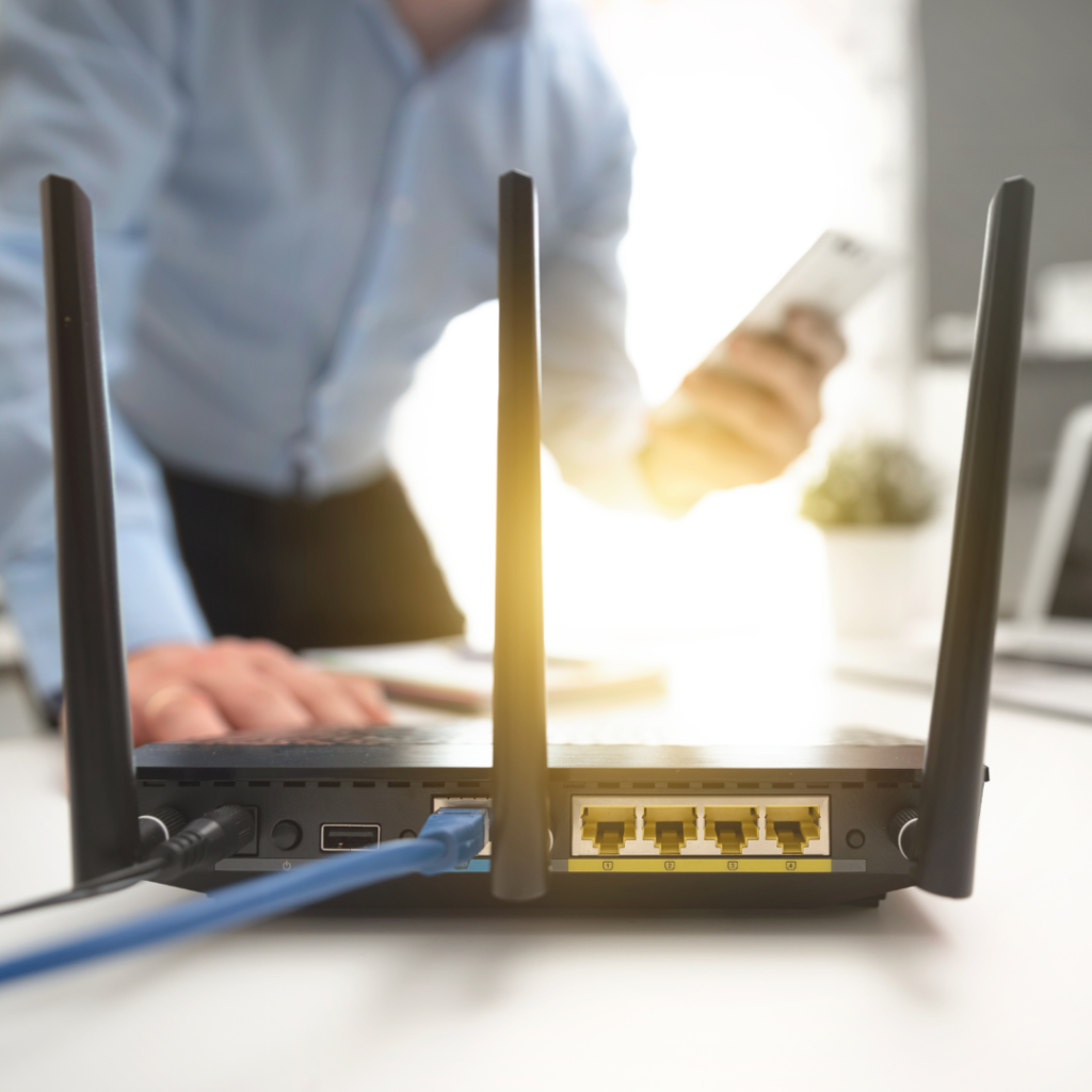 Wireless Router Concept. Man Using Smartphone