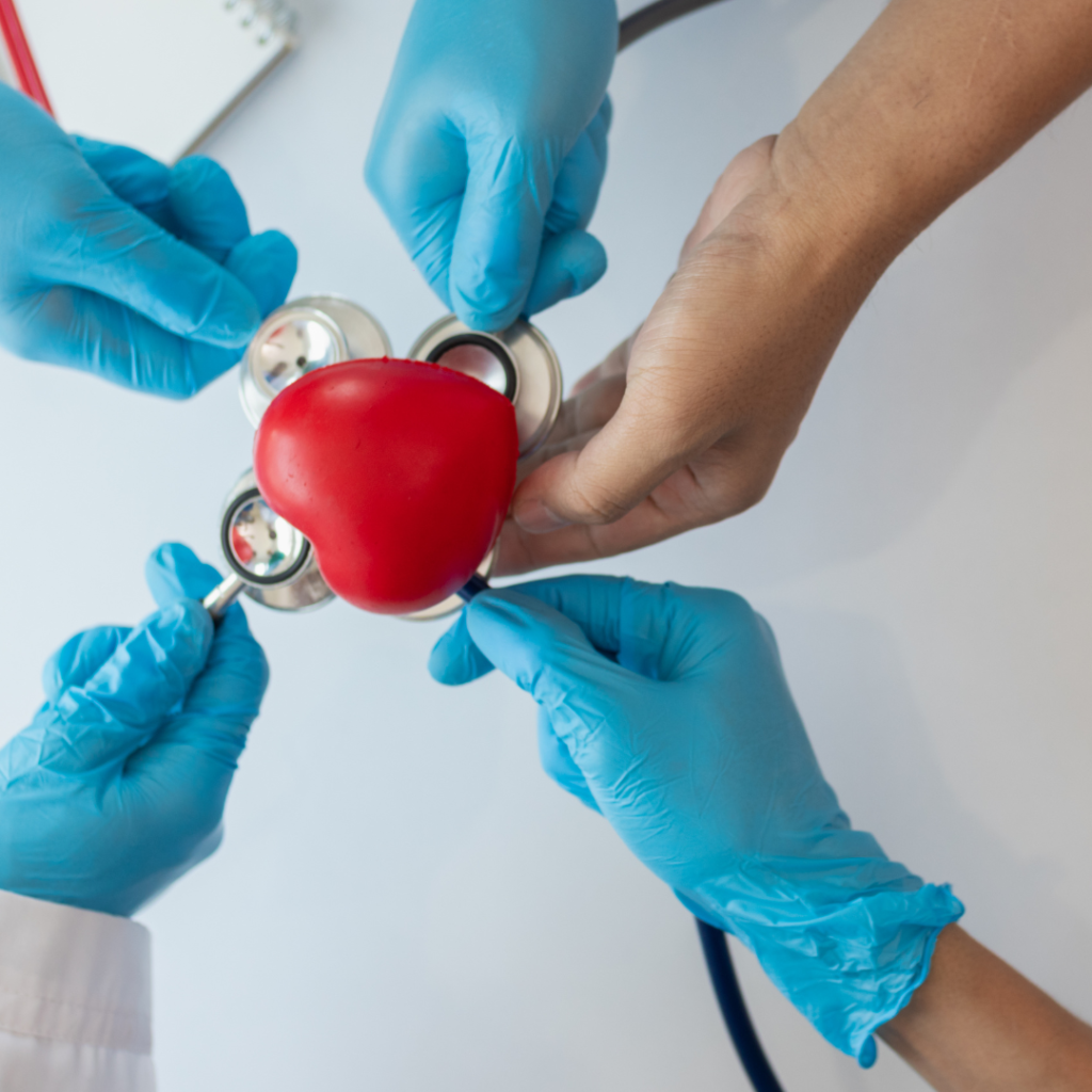 concept of medical team meeting to discuss about treating heart disease with surgery and preventing recurrence of heart disease later. medical team meeting about cardiology to treat patients.