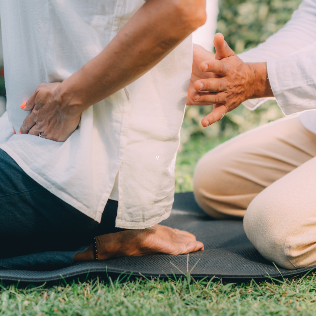Reiki Course Instruction. Woman Sitting , Having A Reiki Healing Treatment.